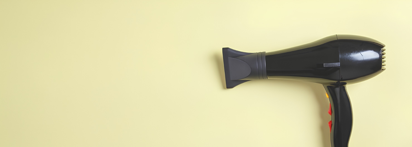 black hair dryer features a styling nozzle